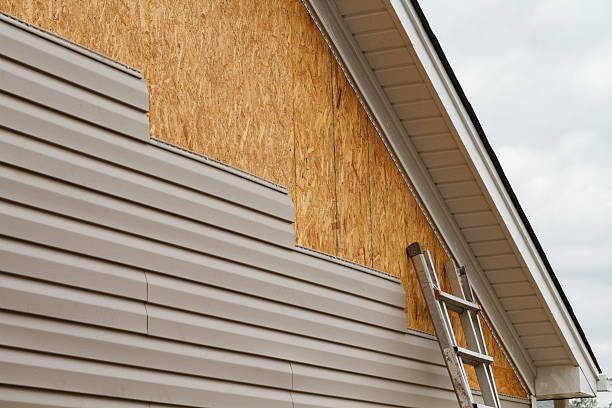 Professional Siding Contractor technician working in East Setauket, NY